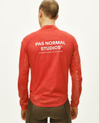 Mechanism Stow Away Jacket - AOP Hibiscus Orange