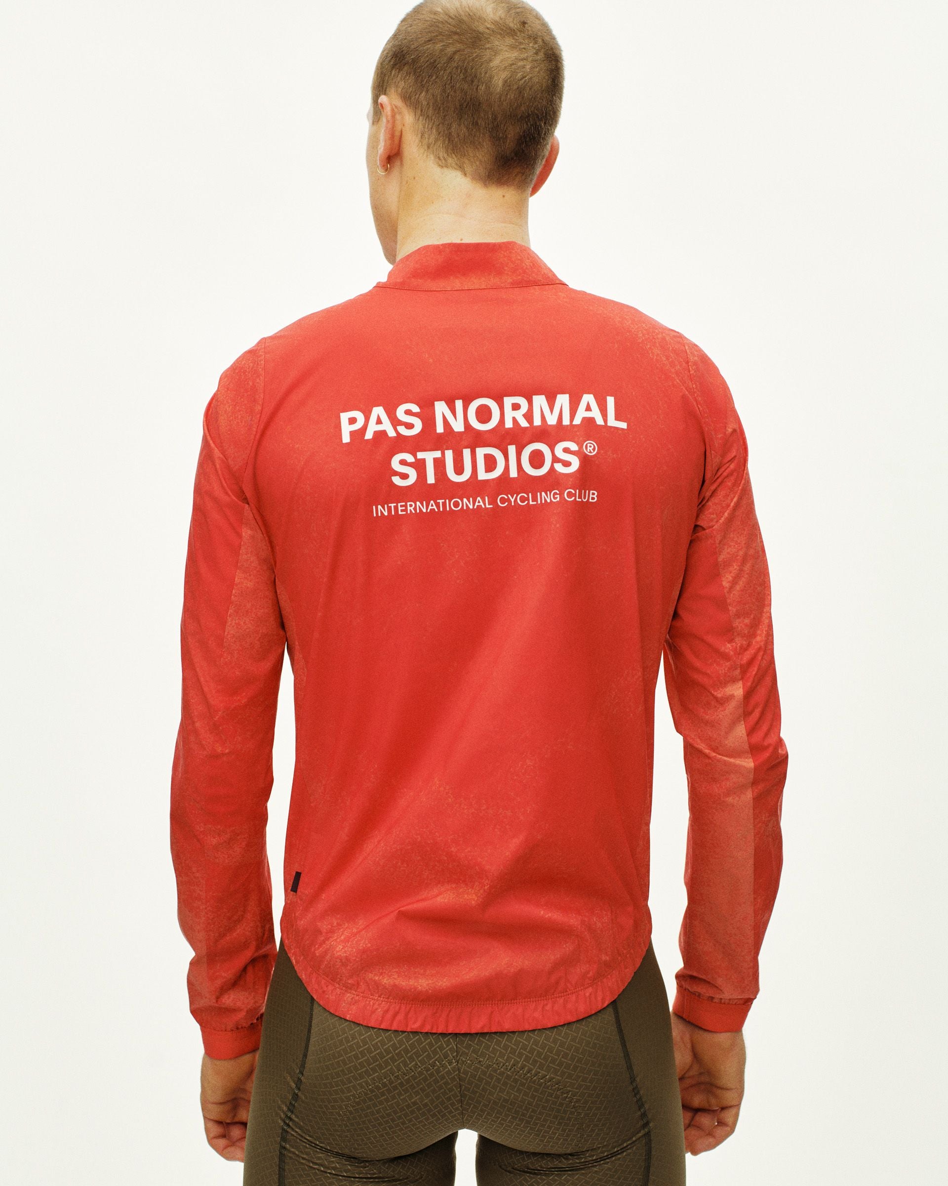 Mechanism Stow Away Jacket - AOP Hibiscus Orange